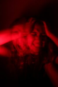 A woman is smiling while holding her hands up photo - Free Angry Image on Unsplash