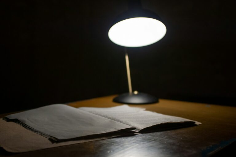 Black table lamp beside book photo - Free Mystery Image on Unsplash