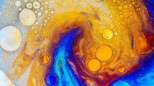 An abstract painting with yellow and blue colors photo - Image on Unsplash
